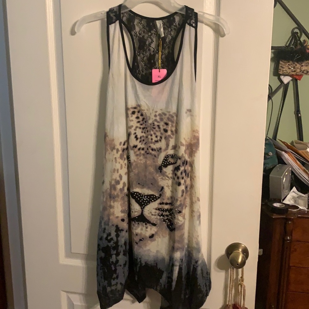 Ladies long below hips animal print top